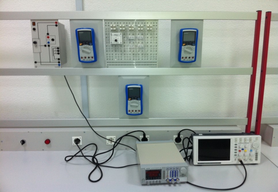 A laboratory setup featuring multiple digital multimeters, a circuit board, and an oscilloscope on a workbench.